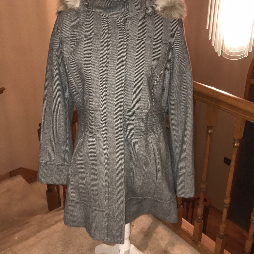 Beautiful winter coat with fur hooded collar.